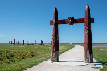 Traditional cultural ornate Maori carved entrance to the reserveのeditorial素材