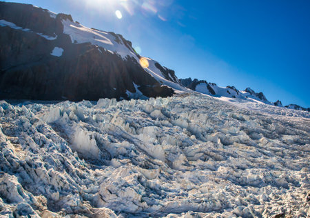 Alpine views of a magnificent Southern Alps glacier high in the mountain peaksの写真素材