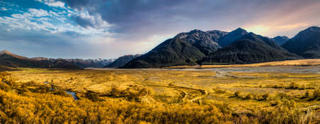 Dramatic sky cloudscape over the mountain range in the remote high countryの写真素材