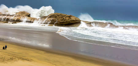 A wider perspective image (from my previously  posted images) taken of massive waves at Castlepoint Reef as a result of a tropical stormの写真素材