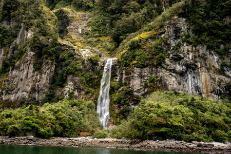 The world famous magical Milford Sound in the Fiordland national park  in stormy weatherの写真素材