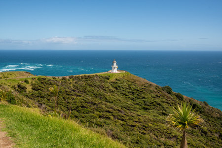 The location where the Tasman sea and Pacific oceans meet at Cape Reinga and its historic lighthouse