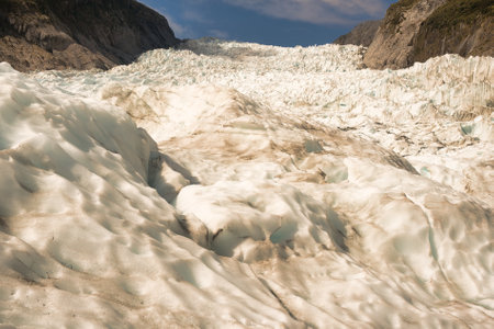 Flying by helicopter to the glacier and then Heli hiking on the glacier floor high up in the...