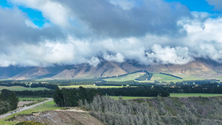 Farming countryside below Mount Hutt and overlooking the Rakaia river and gorgeの写真素材