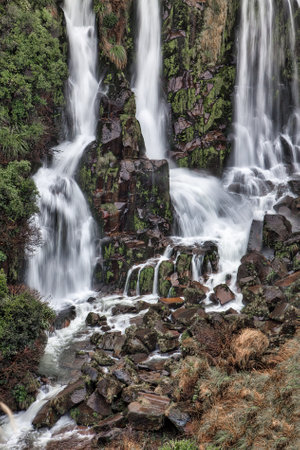 The base of the incredibly tall Waipunga falls that can b e viewed roadside in the forest between Taupo and Napierの写真素材