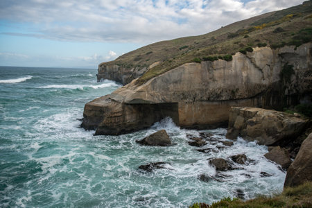Tunnel Beach  located south of St Clair Dunedin ,  has sea-carved sandstone cliffs, rock arches and cavesの写真素材