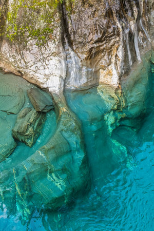 The clear pure turquoise water in the blue springs tourist attraction near Makaroa in Haast Pass en...