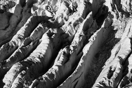 Black and white texture of a cliff. Abstract background for design.