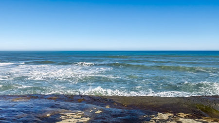 Hiking the short Trueman Track through native forest to a secret beach on the West Coast of the South Island NZの写真素材
