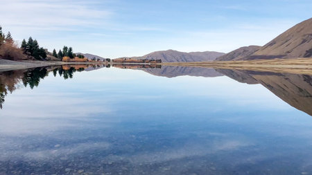 Reflections on Lake Camp one of several lakes in the Ashburton Lakes districtの写真素材