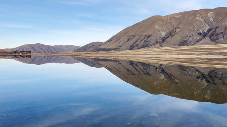 Reflections on Lake Camp one of several lakes in the Ashburton Lakes district