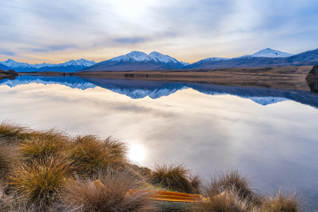 Views of  a rowing boat on the shore of Lake Clearwater from the circuit track around the lakeの写真素材