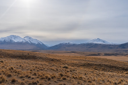 Views of alpine tussock land and mountains on shore of Lake Clearwater from the circuit track around...