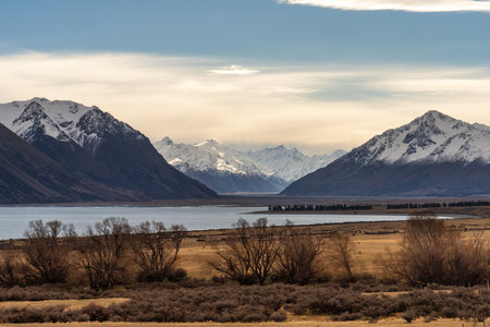 Landscape of New Zealand alps and lake with snow capped mountainsの写真素材