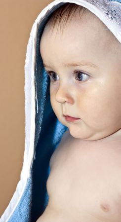 thoughtful baby after bath.の写真素材