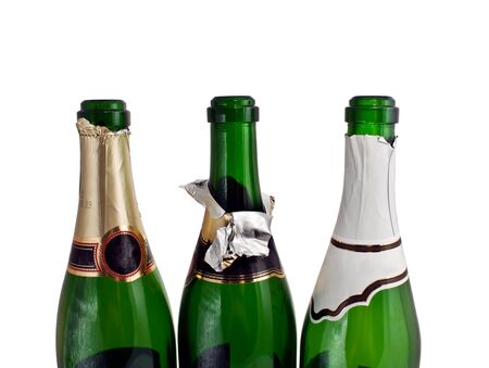 three champagne bottles isolated on a whiteの写真素材