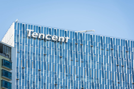 SHENZHEN, CHINA, JANUARY 9 2018: Logo of Tencent on the skyscraper of headquarters. Tencent is one of the largest Internet, gaming and technology companies in the worldのeditorial素材