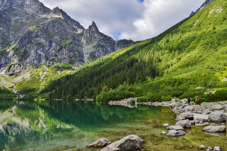 The beautiful lake of Morskie Oko in the Tatra Mountains, near Zakopane, Polandの写真素材