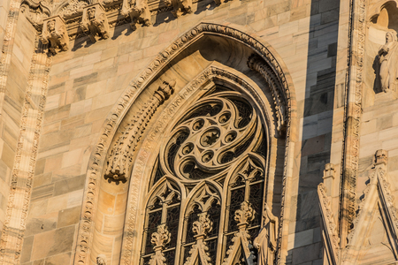 Detail of the Milan Cathedral (Duomo di Milano) at sunset, Italyの写真素材