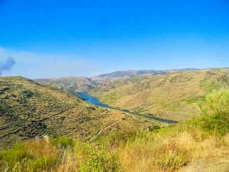 River through the douro valley in Vila Nova de Foz Coa, Portugalの写真素材