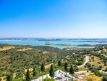 Beautiful countryside landscape with the Alqueva Lake in Alentejio, Portugalの写真素材