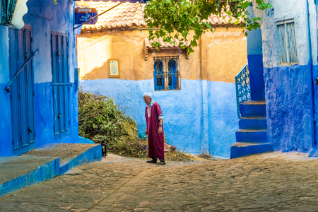 CHEFCHAOUEN, MOROCCO, 22 AUGUST 2018: Traditional moroccan man walking the street during Eid al-Adha, the festival of Sacrificeのeditorial素材