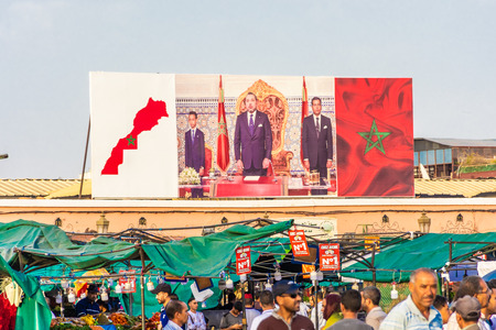 MARRAKECH, MOROCCO, SEPTEMBER 3 2018: Big board with the photo of King Mohammed VI over the market squareのeditorial素材