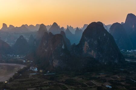 Amazing sunset over the karst landscape of Xingping, Guilin, Chinaの写真素材