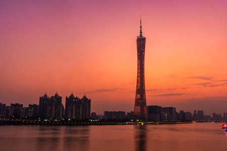 GUANGZHOU, CHINA, 18 NOVEMBER 2019: Cityscape with the Canton Tower on sunsetのeditorial素材