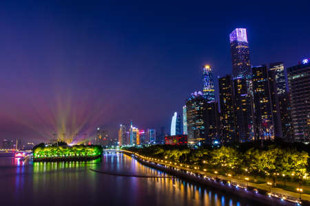 GUANGZHOU, CHINA, 18 NOVEMBER 2019: Cityscape with the Canton Tower on sunsetのeditorial素材