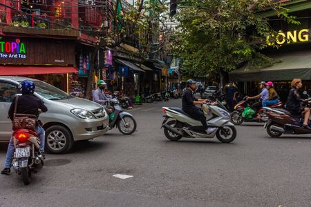 HANOI, VIETNAM, 4 JANUARY 2020: Traffic jam and lots of motorbikes on the roads of the city centerの写真素材
