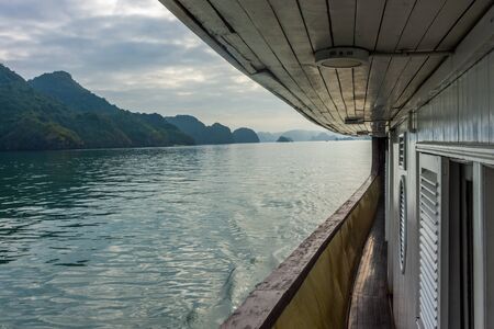 Deck of a ship sailing in Ha Long Bay, Vietnamの写真素材