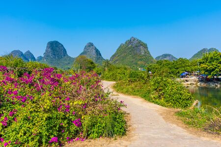 The countryside of Yangshuo, in the Yulong River Valley, Guilin, Guangxi, Chinaの写真素材