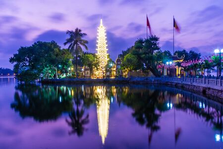 HANOI, VIETNAM, 4 JANUARY 2020: Beautiful sunset over the Tran Quoc Pagoda of Hanoiの写真素材