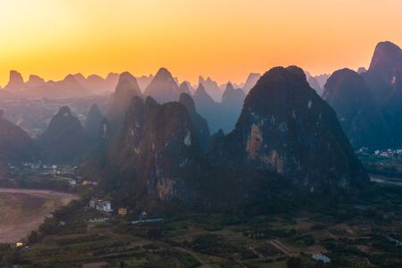 Amazing sunset over the karst landscape of Xingping, Guilin, Chinaの写真素材