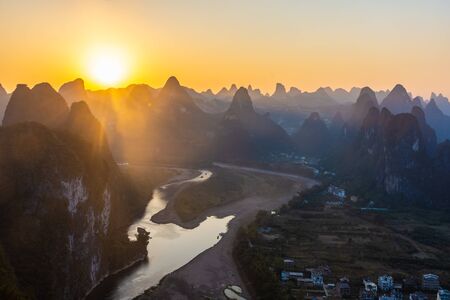Amazing sunset over the karst landscape of Xingping, Guilin, Chinaの写真素材