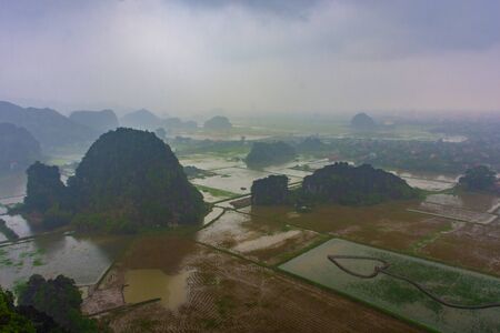 Landscape of Tam Coc during heavy rain, Vietnamの写真素材