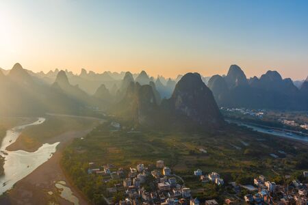 Amazing sunset over the karst landscape of Xingping, Guilin, Chinaの写真素材
