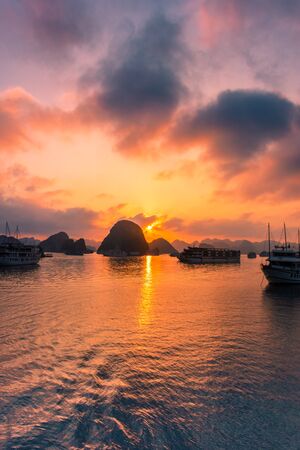 Amazing sunset over Ha Long Bay, Vietnamの写真素材