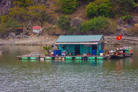 HA LONG BAY, VIETNAM, 6 JANUARY 2020: Traditional floating village on the sea in Ha Long Bayのeditorial素材