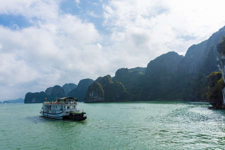 HA LONG BAY, VIETNAM, JANUARY 6 2020: Ship in the bayのeditorial素材