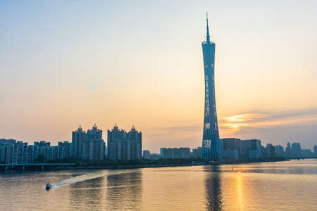 GUANGZHOU, CHINA, 18 NOVEMBER 2019: Cityscape with the Canton Tower on sunsetのeditorial素材