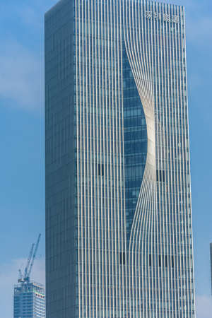 SHENZHEN, CHINA, 02 JANUARY 2020: The twisted skyscraper of Shenzhen business district, symbol of environmental sustainabilityのeditorial素材