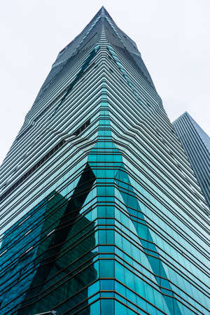 SHENZHEN, CHINA, 02 JANUARY 2020: The twisted skyscraper of Shenzhen business district, symbol of environmental sustainabilityのeditorial素材