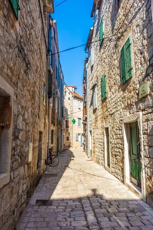 Ancient street of Stari Grad, little town in Hvar Island, Croatiaの写真素材