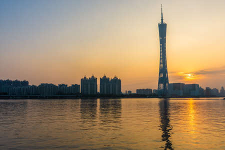 GUANGZHOU, CHINA, 18 NOVEMBER 2019: Cityscape with the Canton Tower on sunsetのeditorial素材