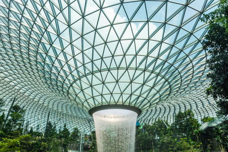 SINGAPORE, 27 SEPTEMBER 2019: The biggest indoor waterfall in the world in Jewel Changi Airport