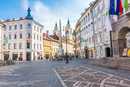 LJUBLJANA, SLOVENIA, 5th AUGUST 2019: The beautiful main street of the historic center, with the Cathedral in the backgroundのeditorial素材