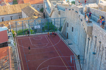 DUBROVNIK, CROATIA, AUGUST 13 2019: Crooked football field near the wallsのeditorial素材
