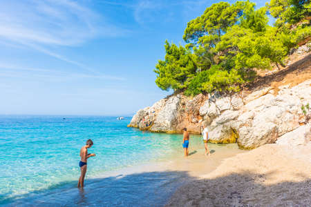 HVAR, CROATIA, AUGUST 8 2019: People enjoying The beautiful and crystal water of Jagodna Beach in Hvar Island, Adriatic Seaのeditorial素材